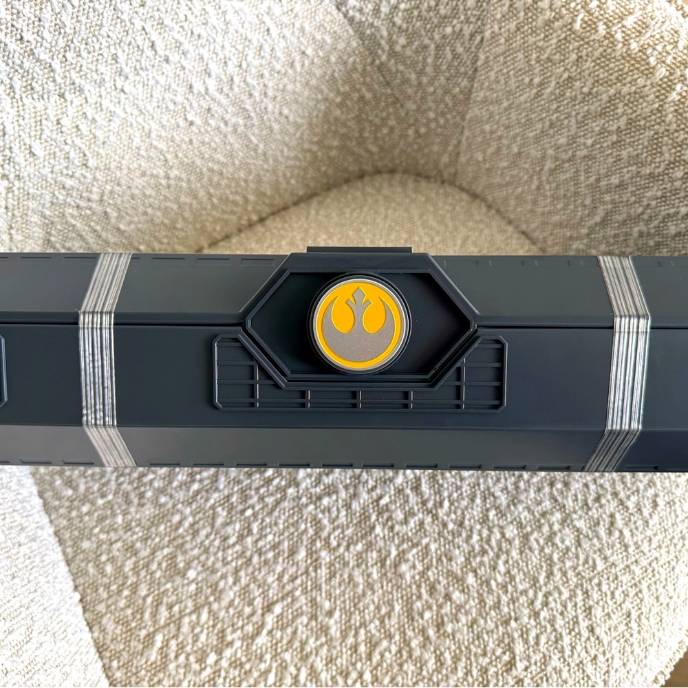 Black and Yellow Themed Box with Emblem